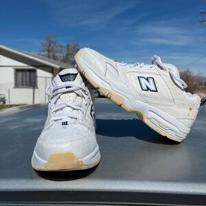 New Balance White Leather Sneakers with Navy Logo